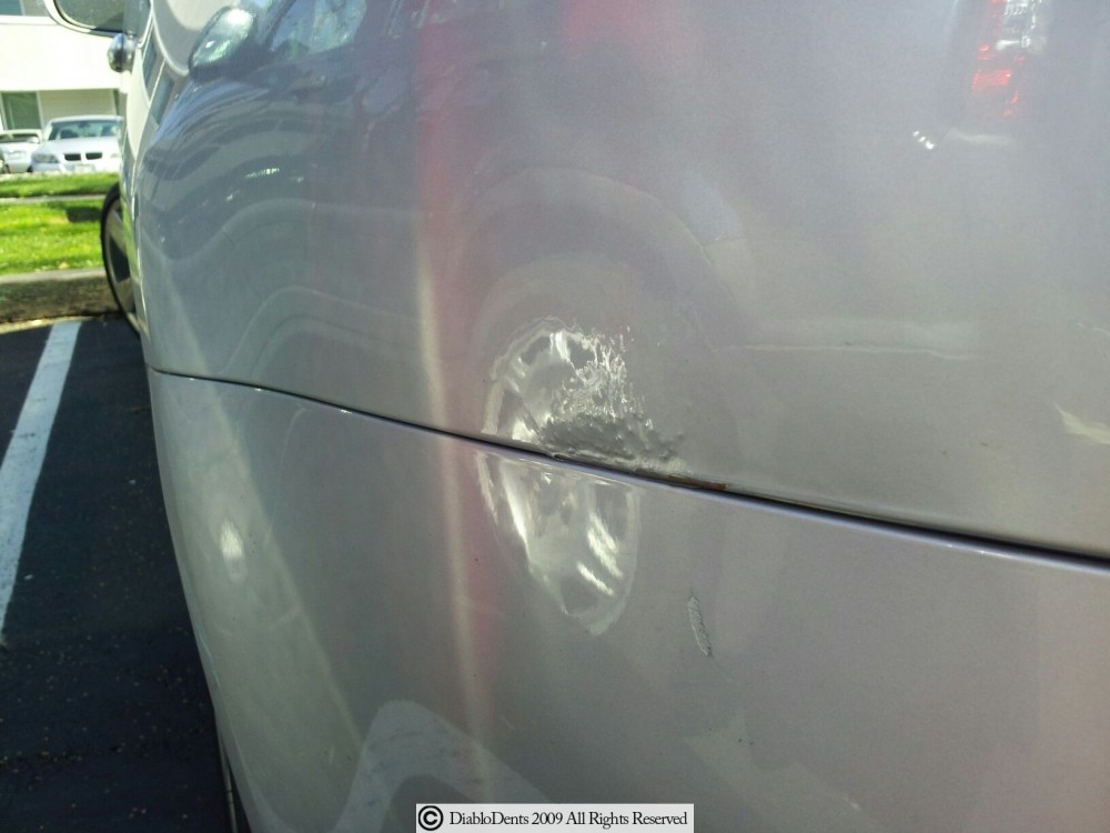 DIY dent repair results photo - Shocking DIY Dent Repair Fails: Why You Should Leave PDR to the Experts!